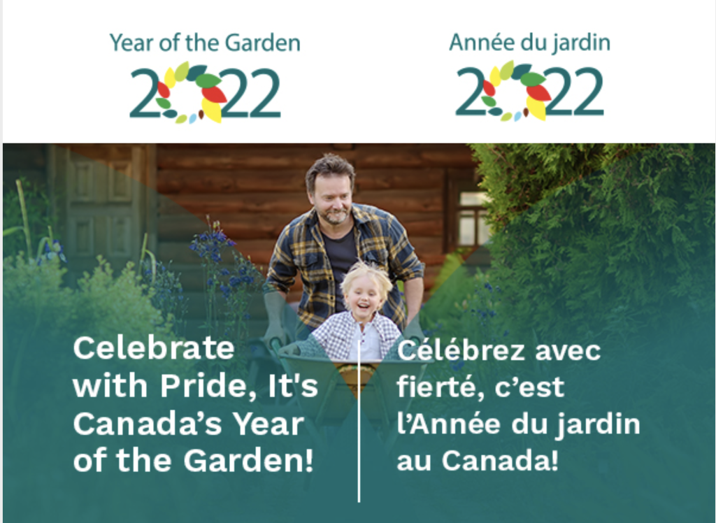 Man pushing child in wheelbarrow.